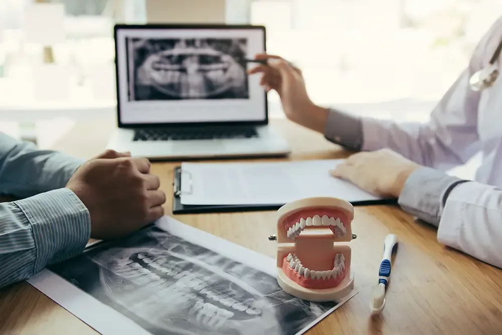 Patient filling out dental
  forms